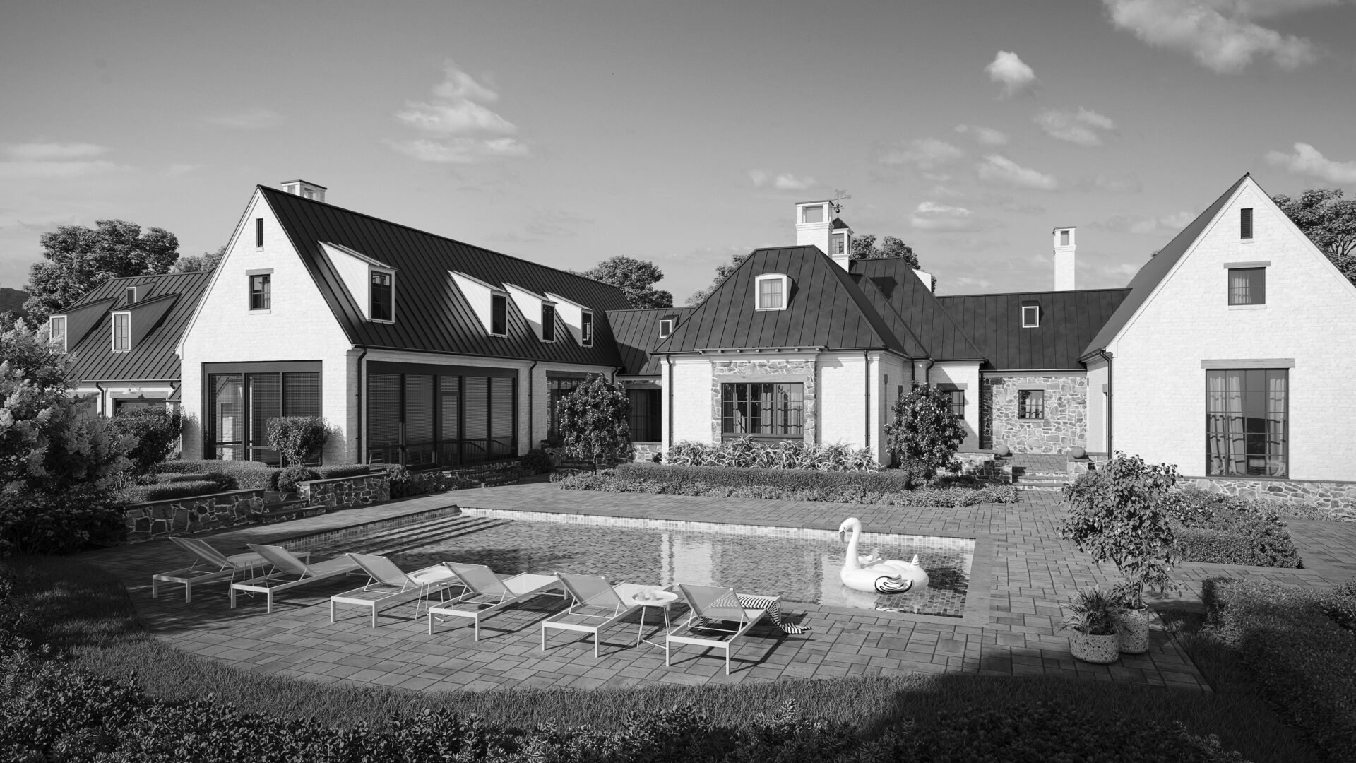 A black and white photo of an outdoor pool.