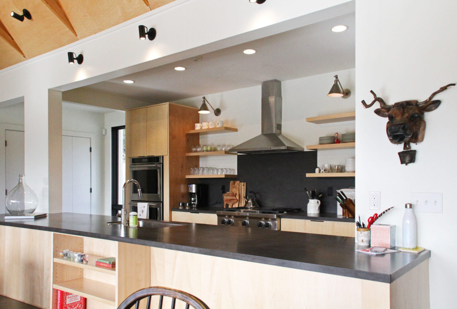 A kitchen with a stove and a counter