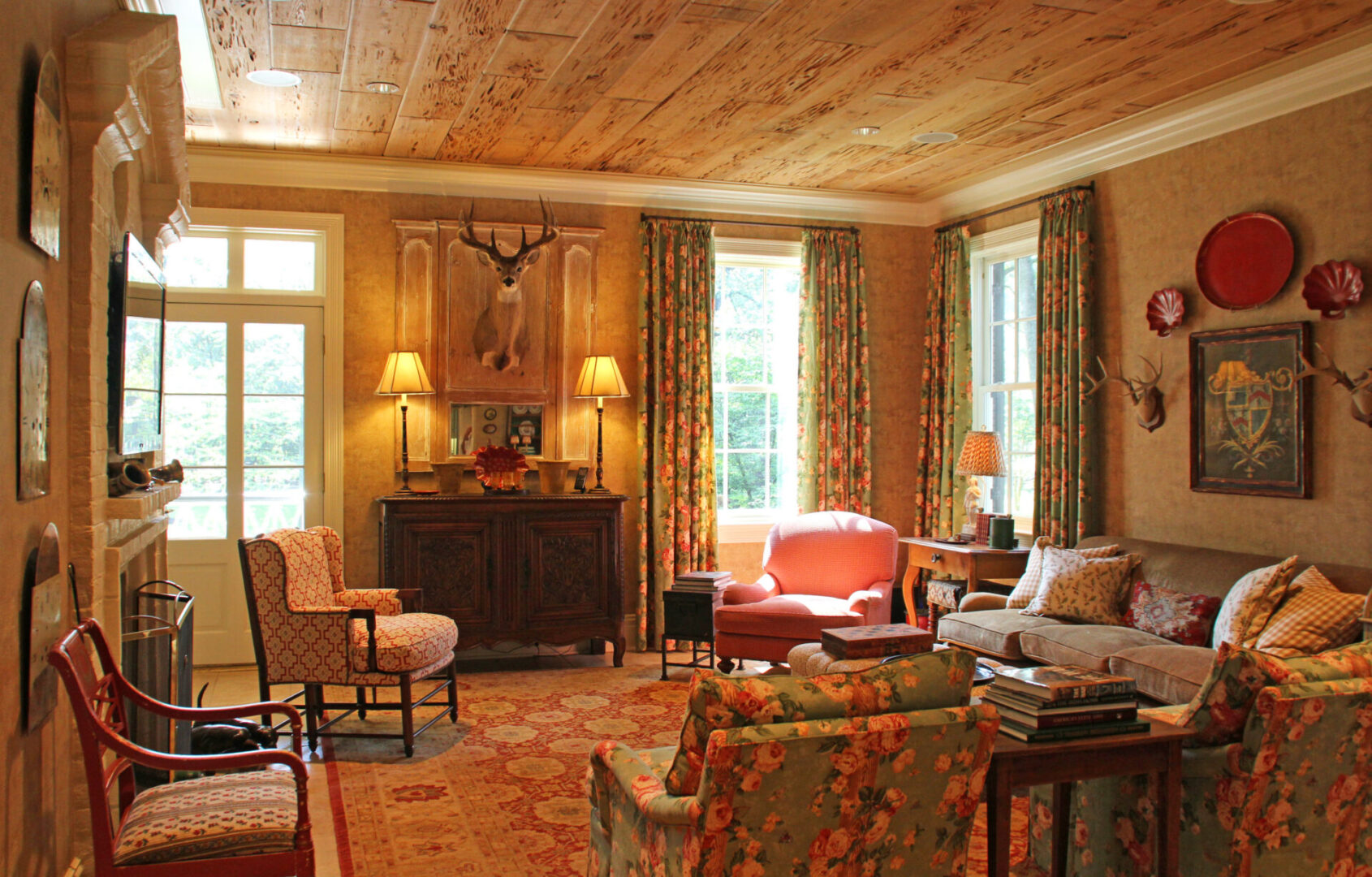 A living room with many chairs and couches