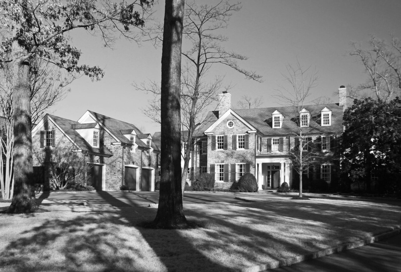 A black and white photo of some houses