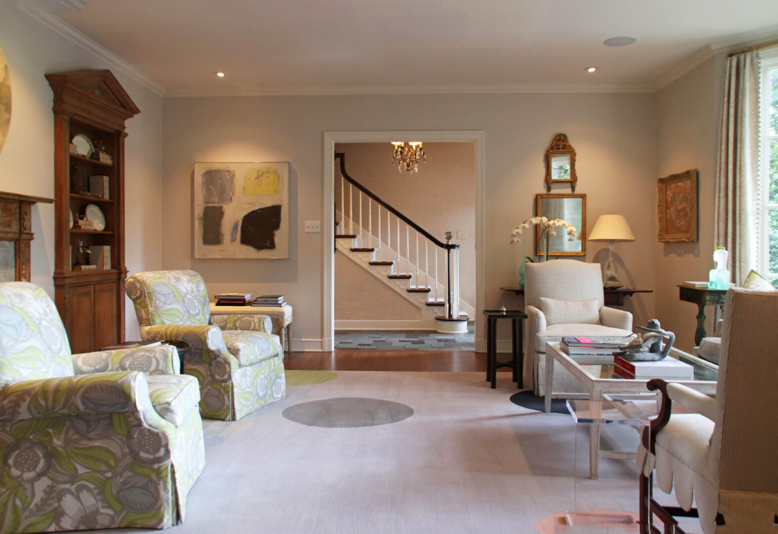 French Provincial living room with white furniture and beige walls.