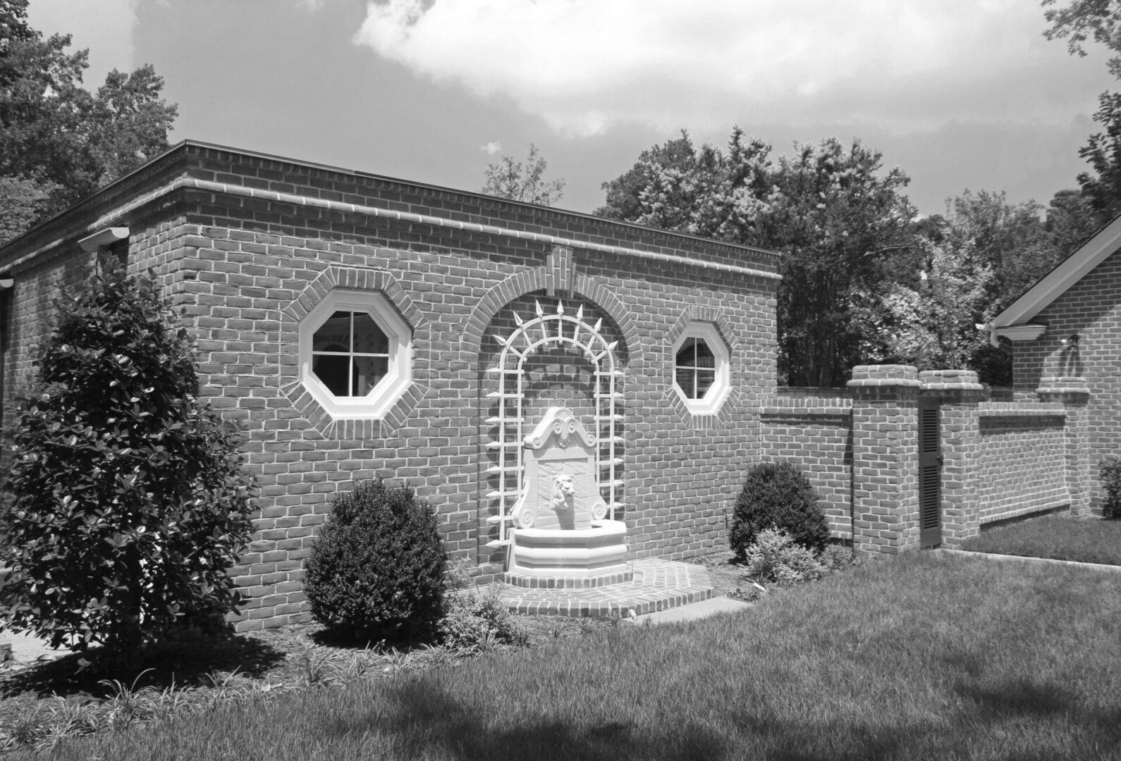 A black and white photo of an old building.