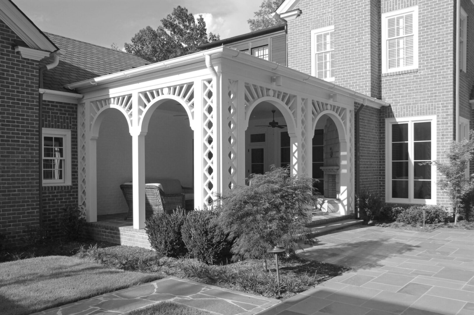 A black and white photo of an old building.