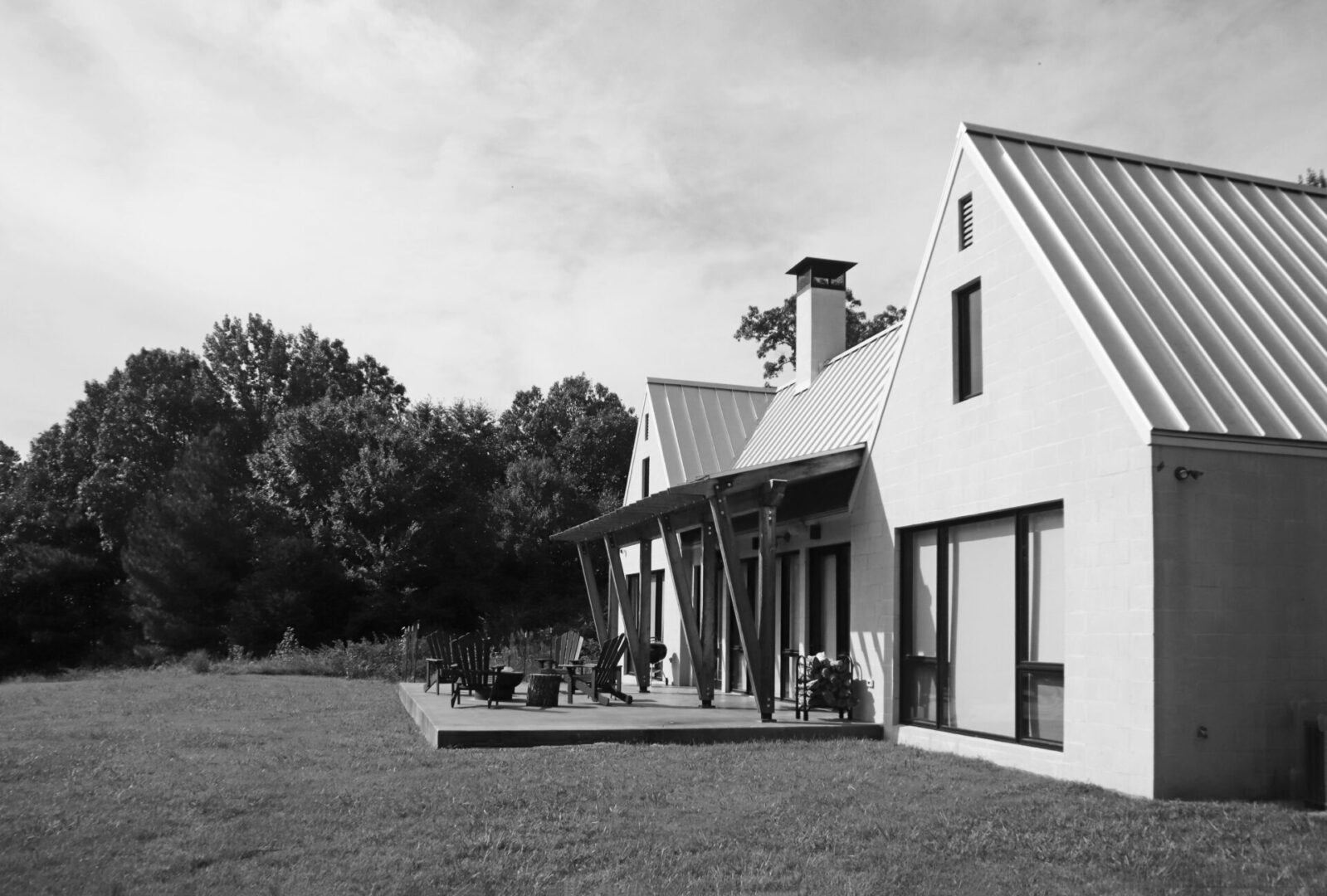 A black and white photo of an old house