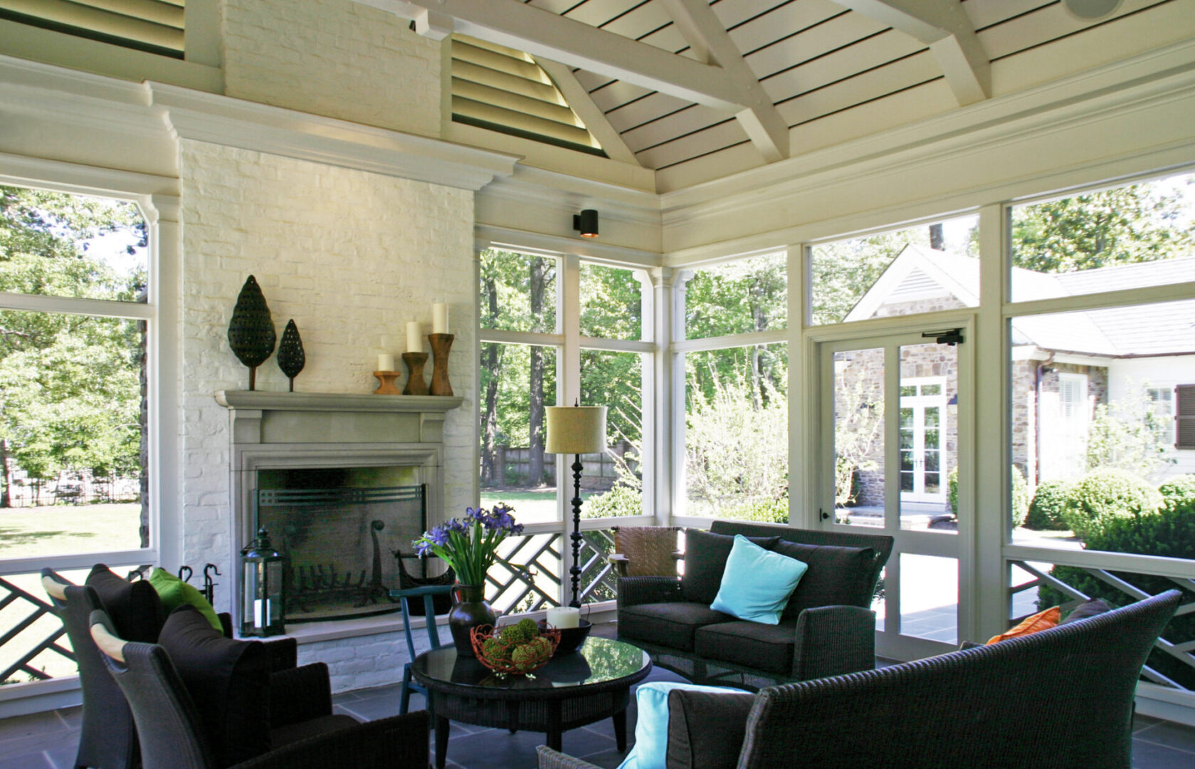 A living room with couches and chairs in it