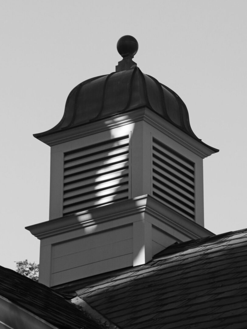 American Georgian top of a building.