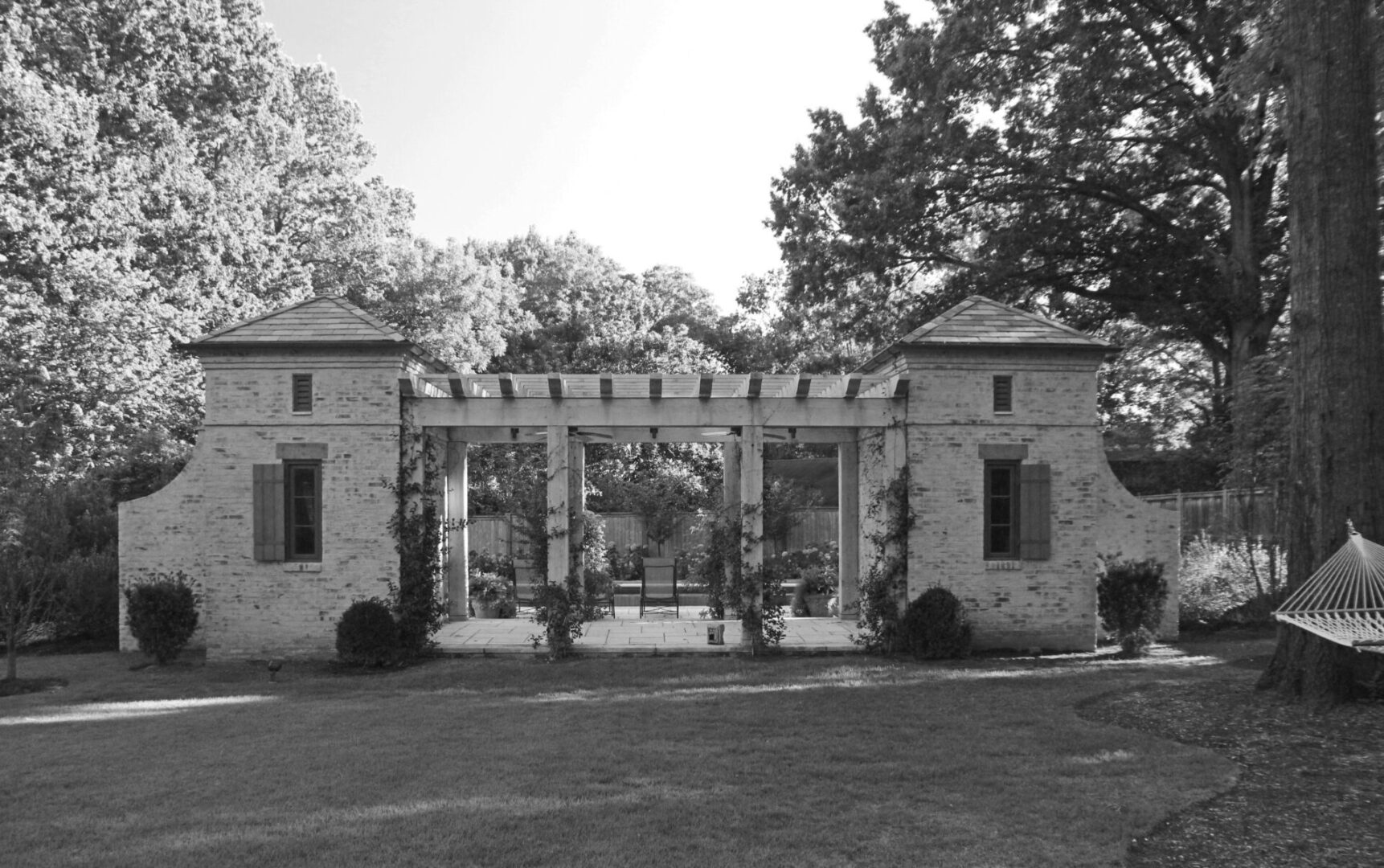 A black and white photo of an old building.