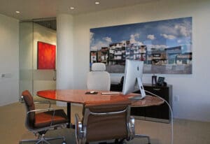 A room with two chairs and a desk