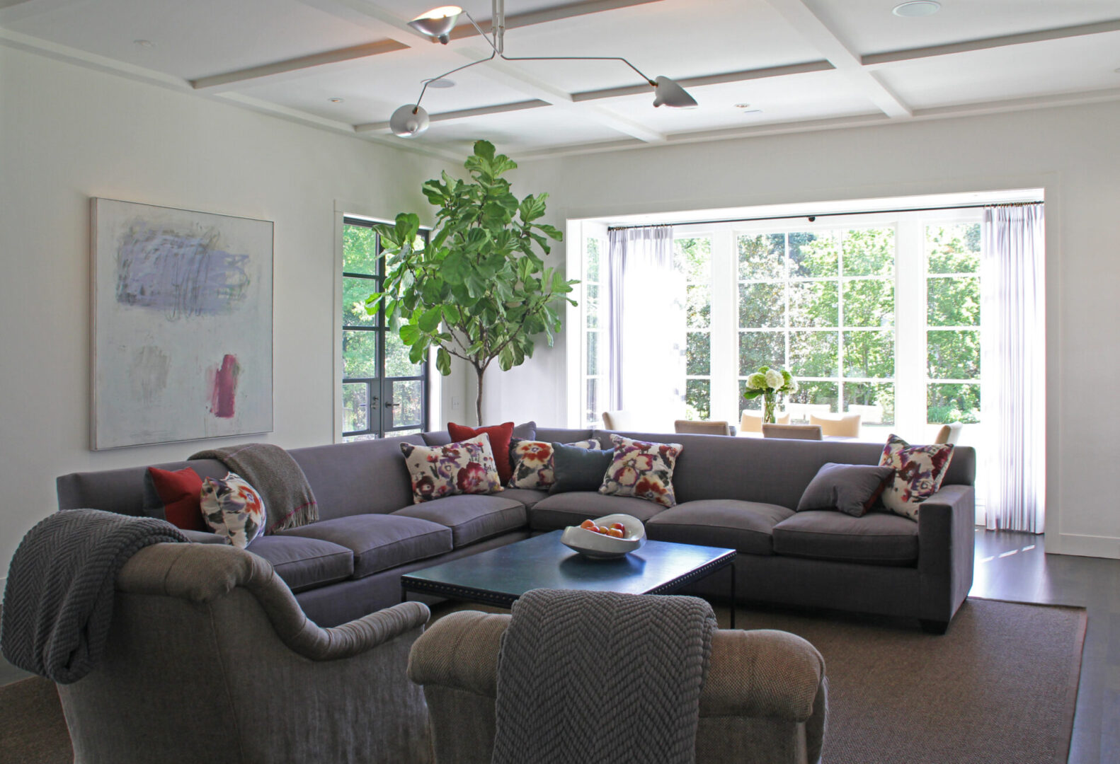 A living room with couches and tables in it