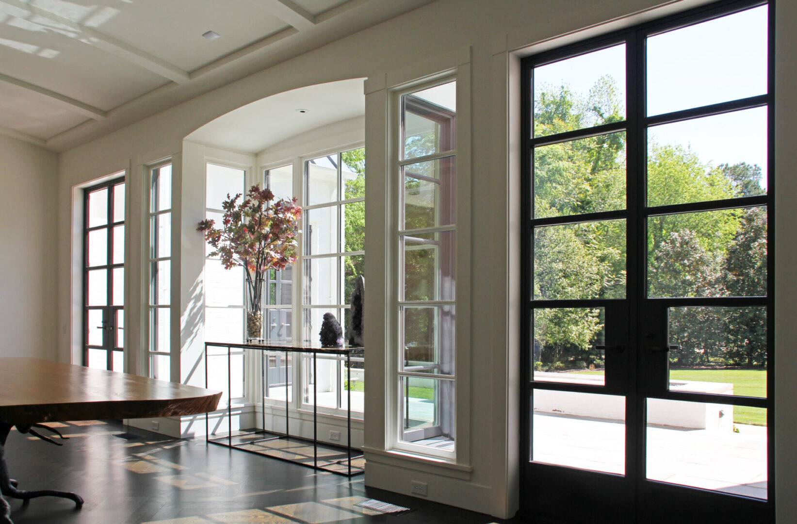 A large open door leading to the outside of a house.